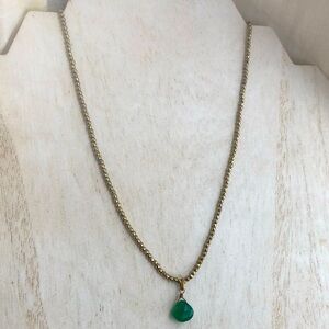 Copper beaded necklace with green stone pendant